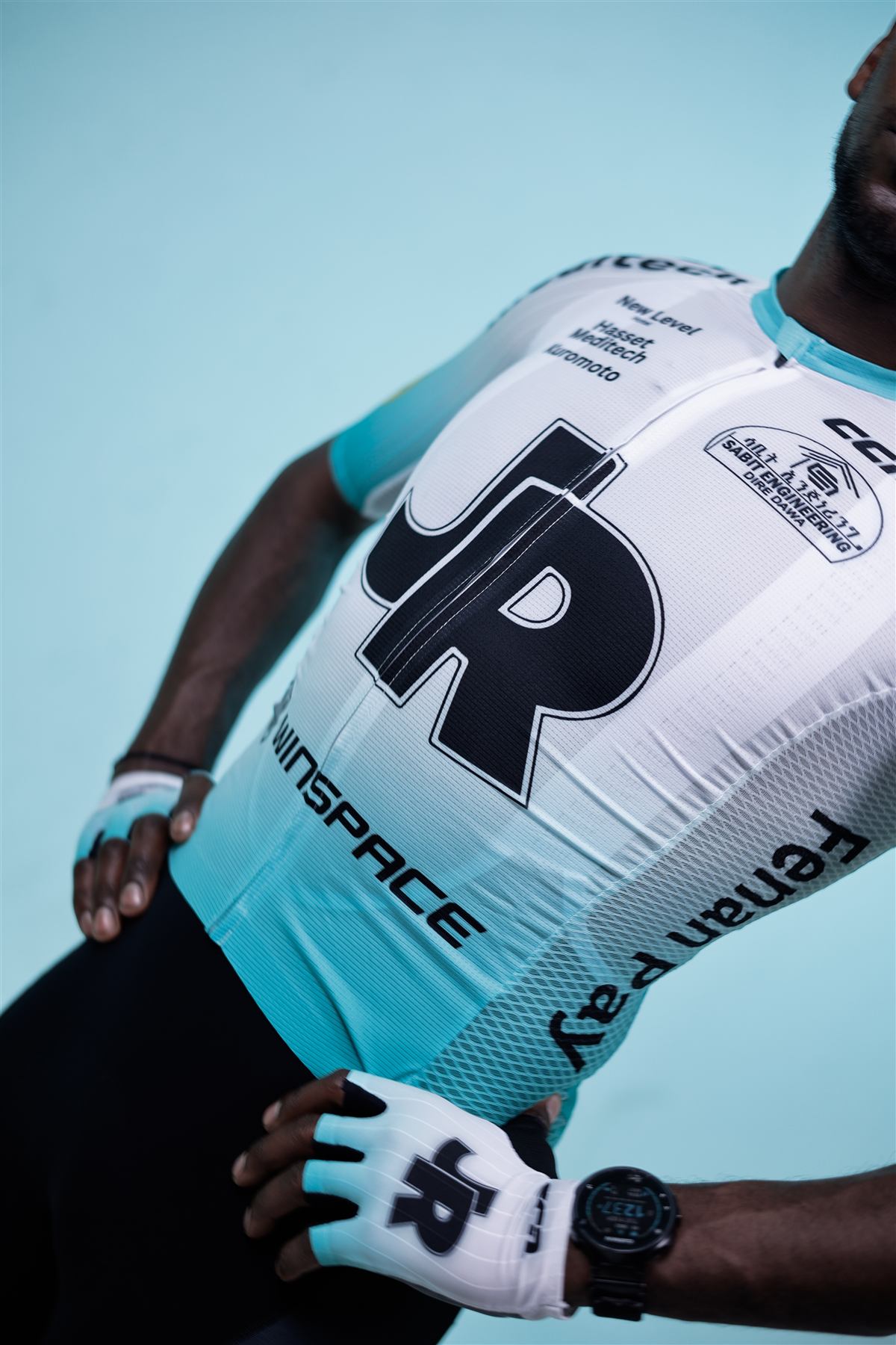 Close view of the JR jersey and team gloves