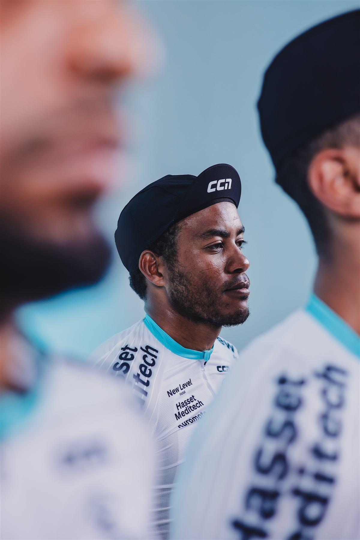 Close portrait of a JR rider in a black cap